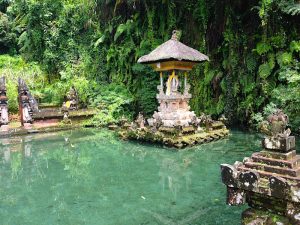 temple lake with statue