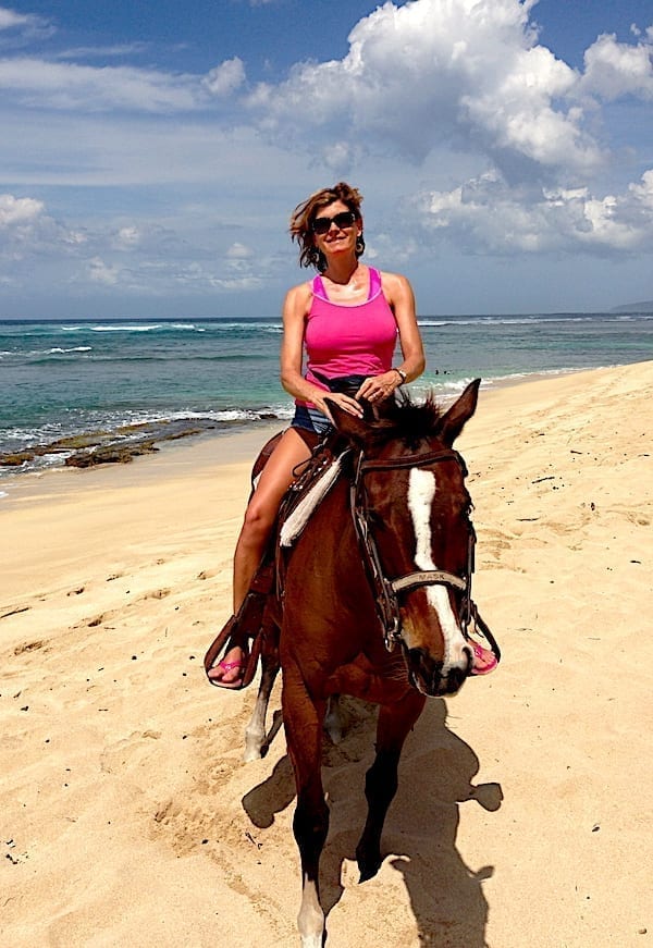 Gundi Gabrielle, Digital Nomad, Hawaii, horseback riding on the beach - SassyZenGirl.com